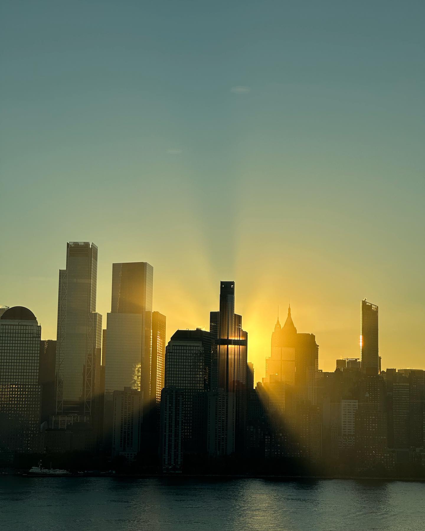 Lower Manhattan skyline at golden hour